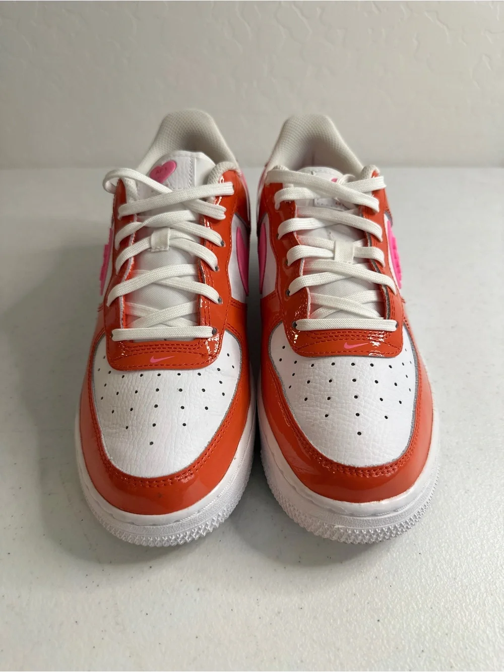 Nike Air Force 1 LV8 - Low-Top Sneakers in Red with Pink Heart Swoosh
